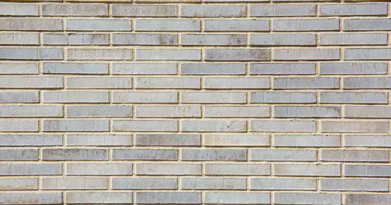 Strijp R detail van muur met lichtgrijze baksteen