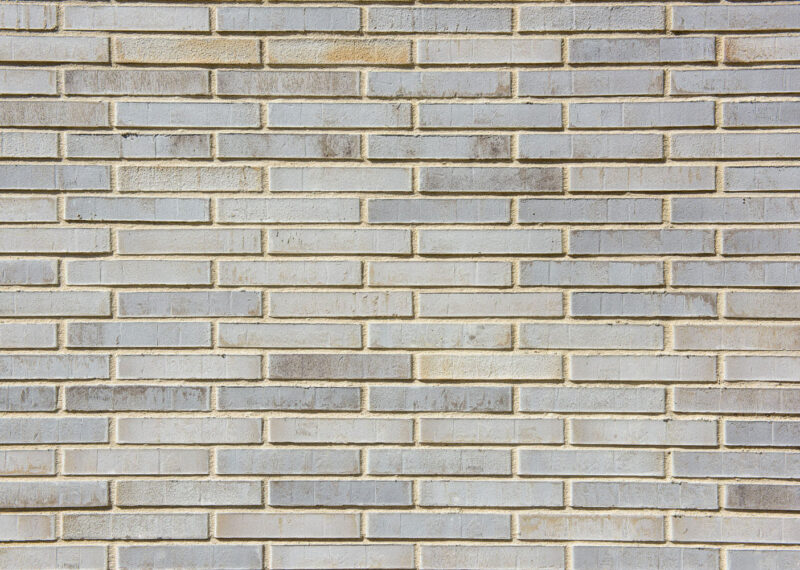 Strijp R detail van muur met lichtgrijze baksteen